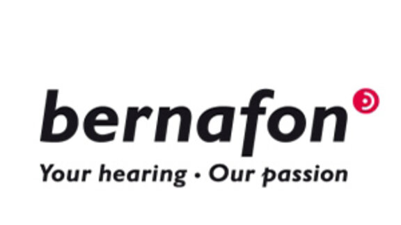 Logo der Firma Bernafon als Schriftzug mit dem Text "Your Hearing - Our Passion" darunter - verlinkt zur Homepage von Bernafon